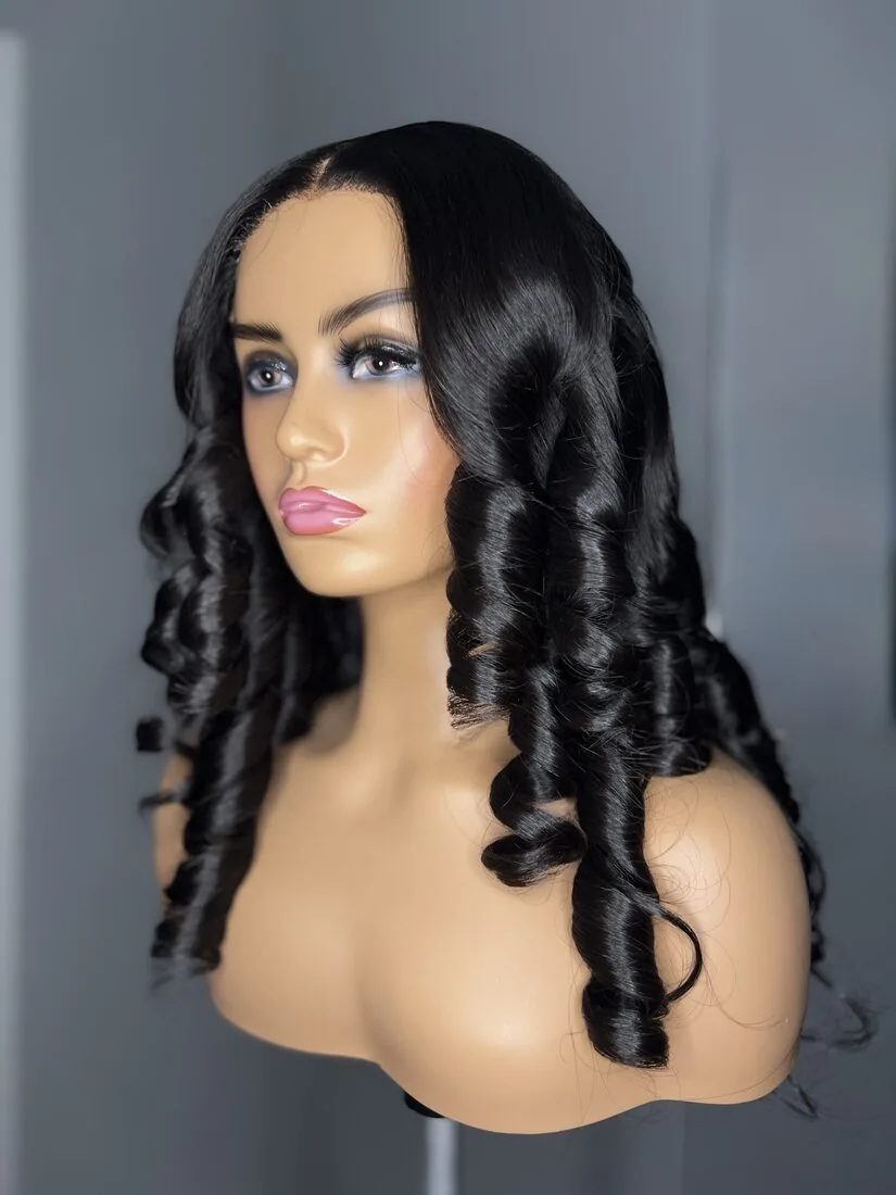 Ombre wig with a curled finished style on a mannequin